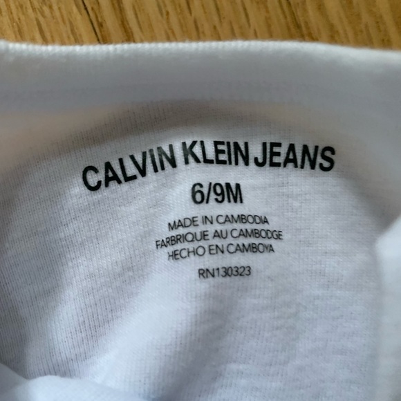 Calvin Klein Jeans 4 Pack Onesies - Picture 7 of 7